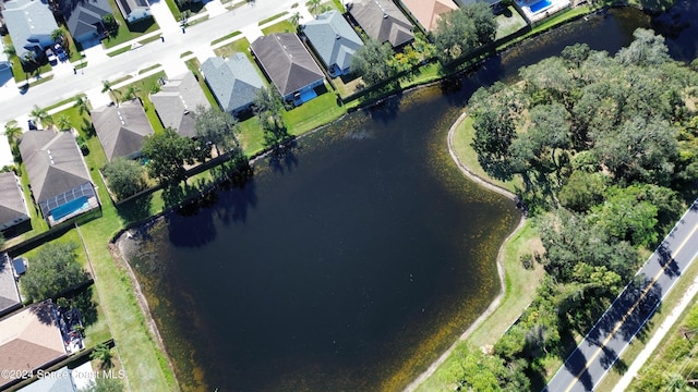 drone / aerial view with a water view