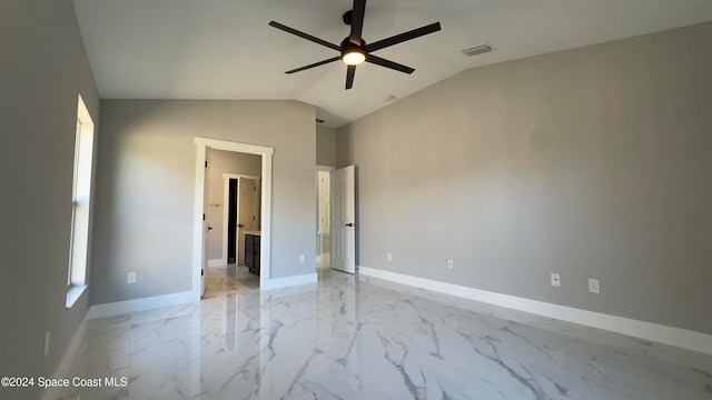 interior space featuring ceiling fan and lofted ceiling