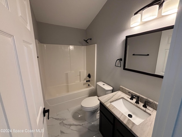 full bathroom with bathtub / shower combination, vanity, and toilet