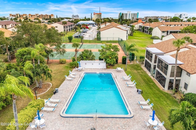 view of swimming pool featuring a patio area