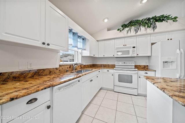 kitchen featuring stone counters, sink, lofted ceiling, white appliances, and white cabinets