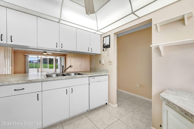 kitchen featuring white dishwasher, ceiling fan, white cabinets, and sink