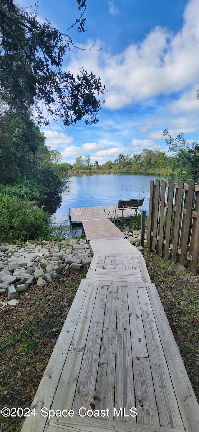 view of dock with a water view