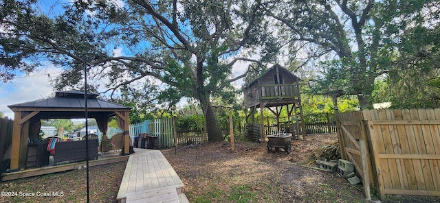 205 Flamingo Dr, Cocoa, FL 32926 - fenced backyard featuring a gazebo