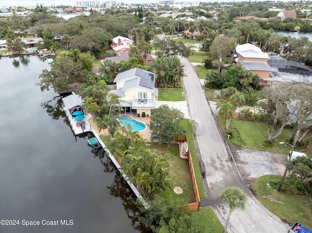 491 Indian Creek Dr, Cocoa Beach, FL 32931 - drone / aerial view of a nearby body of water and a pool