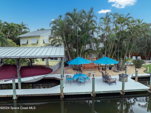 491 Indian Creek Dr, Cocoa Beach, FL 32931 - dock with boat lift