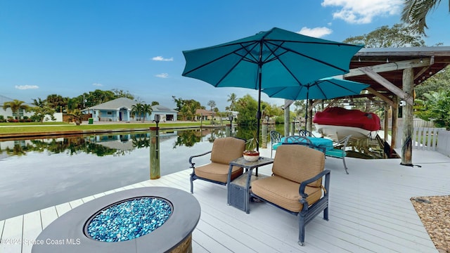 491 Indian Creek Dr, Cocoa Beach, FL 32931 - deck featuring a water view and a dock