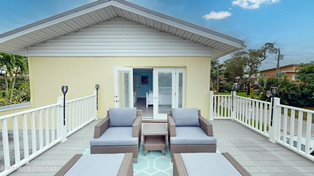 491 Indian Creek Dr, Cocoa Beach, FL 32931 - wooden terrace with outdoor lounge area