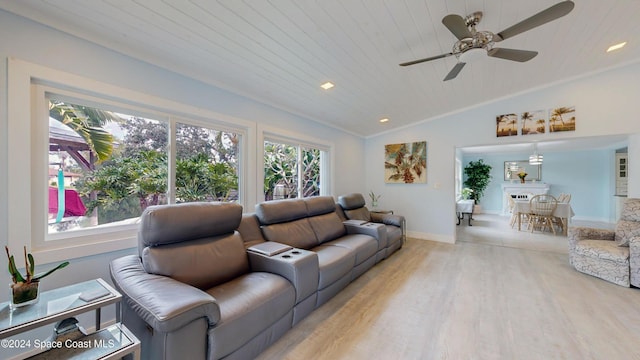 491 Indian Creek Dr, Cocoa Beach, FL 32931 - living room featuring plenty of natural light, light wood-style flooring, a ceiling fan, lofted ceiling, and baseboards