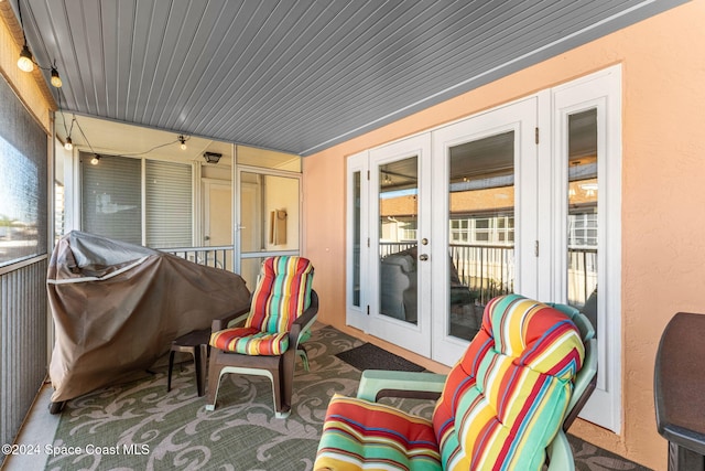 view of patio / terrace featuring a grill and french doors