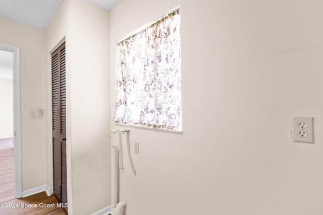 bathroom with hardwood / wood-style floors