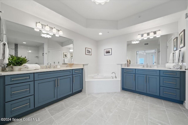 bathroom featuring plus walk in shower and vanity