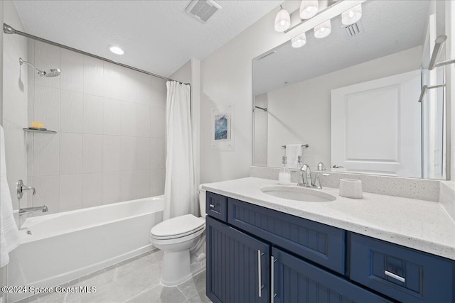 full bathroom with vanity, toilet, shower / bathtub combination with curtain, and a textured ceiling