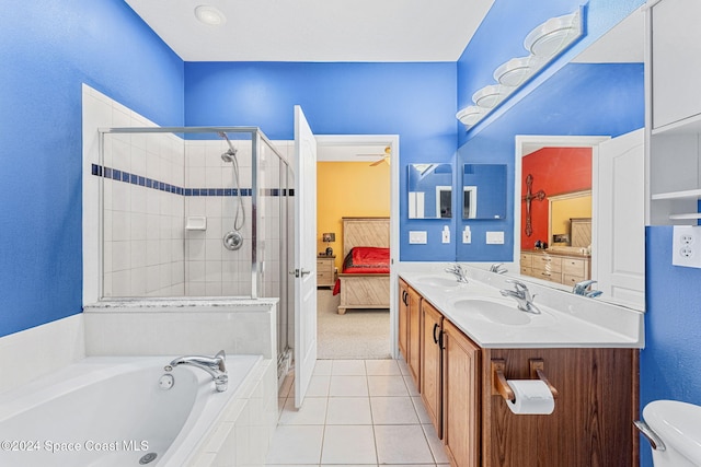 full bathroom with toilet, vanity, tile patterned floors, and plus walk in shower