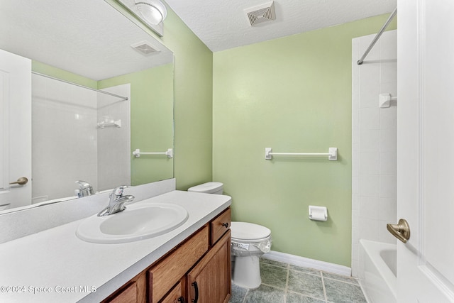 full bathroom featuring bathtub / shower combination, toilet, vanity, and a textured ceiling