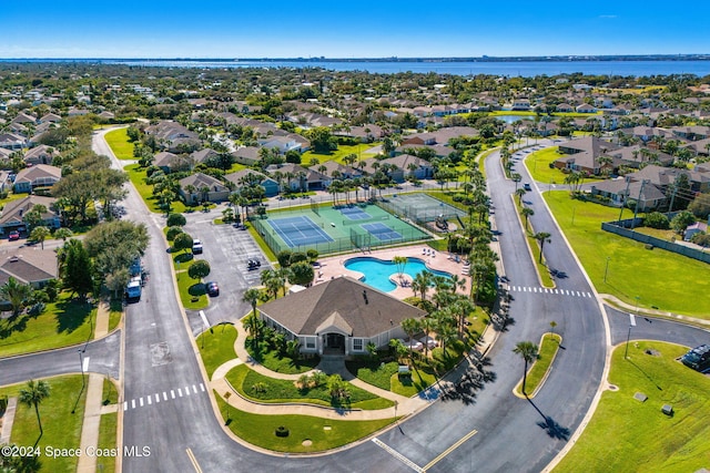 birds eye view of property featuring a water view