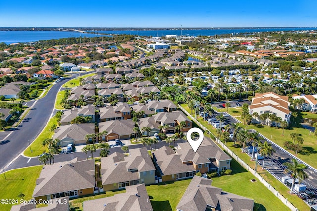 drone / aerial view featuring a water view