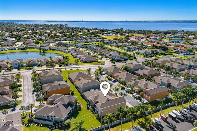 bird's eye view with a water view