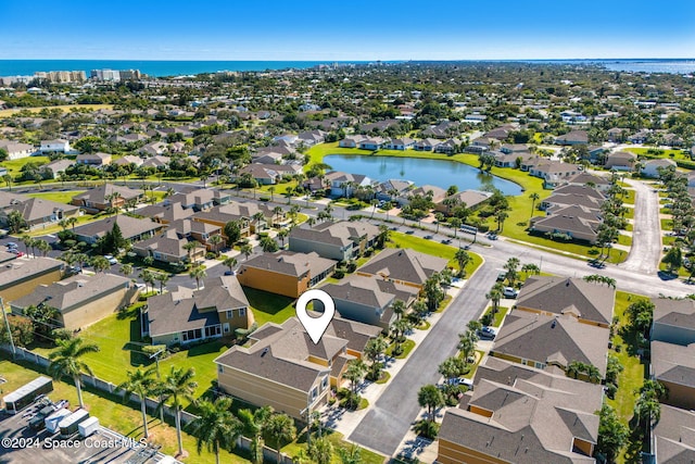 drone / aerial view featuring a water view