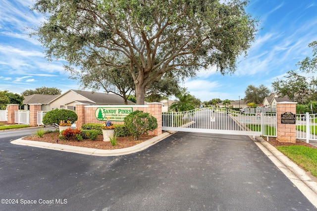 2122 Spring Creek Cir NE, Palm Bay, FL 32905 - community sign featuring a gate