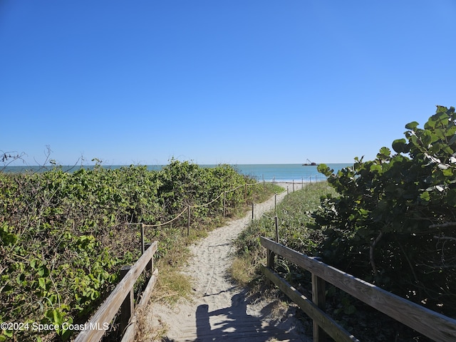 property view of water featuring a view of the beach