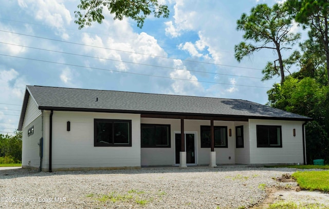 3470 W Eau Gallie Blvd, Melbourne, FL 32935 - rear view of property featuring a shingled roof