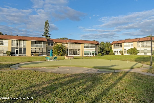 view of community with a lawn