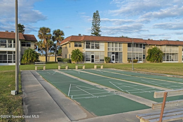 view of community with a yard