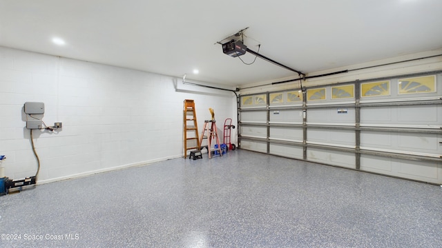 garage featuring a garage door opener