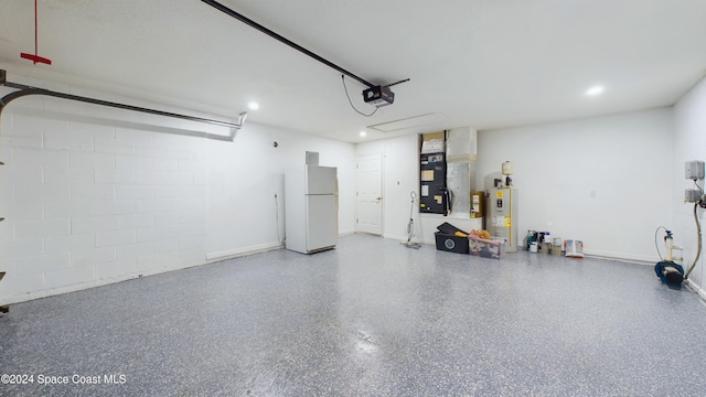 garage with white fridge, electric water heater, a garage door opener, and heating unit