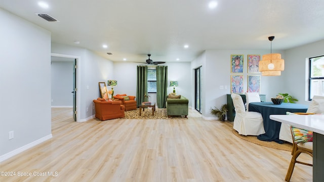 interior space featuring ceiling fan and light hardwood / wood-style floors