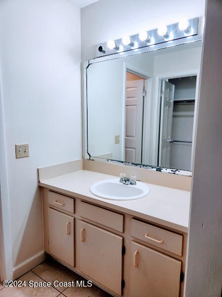 bathroom with vanity and tile patterned floors