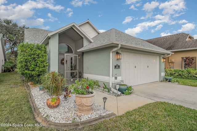 view of front of property featuring a garage