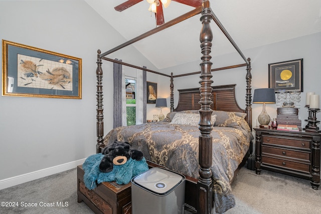 bedroom featuring ceiling fan, carpet floors, and vaulted ceiling