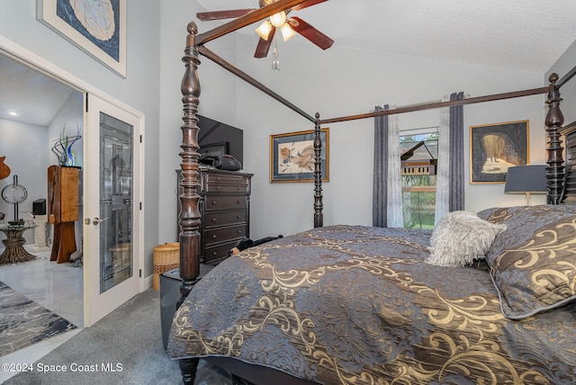 bedroom with carpet, ceiling fan, a textured ceiling, and high vaulted ceiling