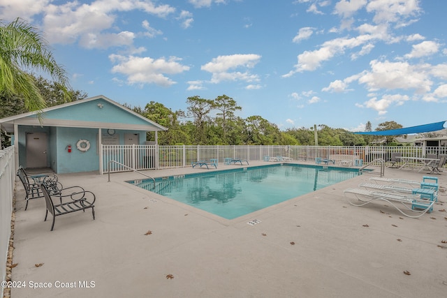 view of pool featuring a patio area