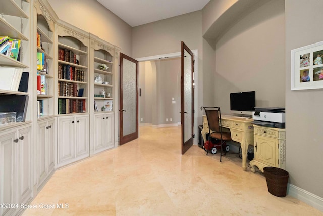 office with french doors and baseboards