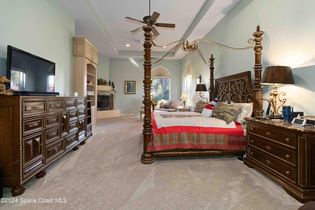 bedroom with ceiling fan and light colored carpet