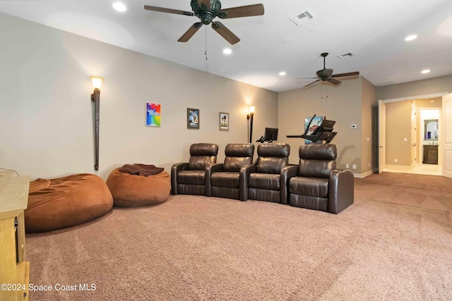 carpeted home theater featuring recessed lighting, visible vents, ceiling fan, and baseboards