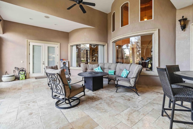 view of patio / terrace featuring ceiling fan, outdoor lounge area, and french doors