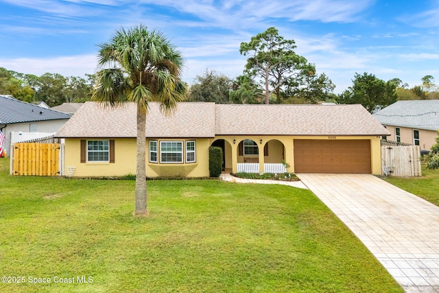 single story home featuring a garage, a porch, and a front yard