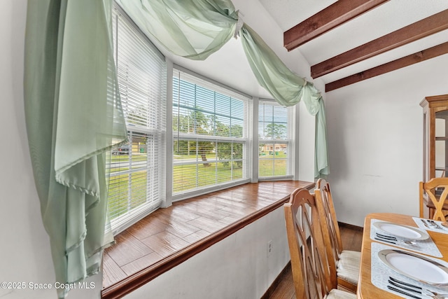 office with vaulted ceiling with beams and hardwood / wood-style floors