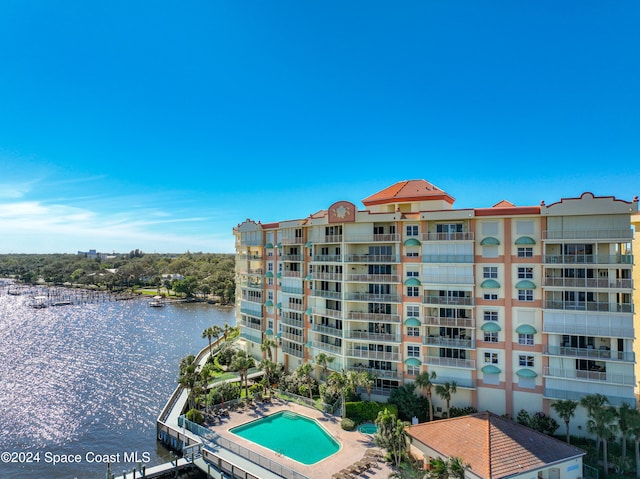 view of property with a water view