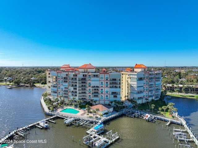 birds eye view of property featuring a water view