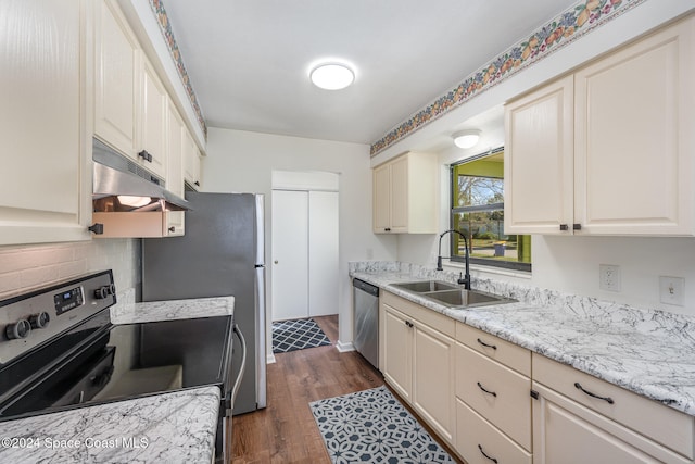 kitchen featuring light stone countertops, sink, stainless steel dishwasher, dark hardwood / wood-style floors, and black / electric stove