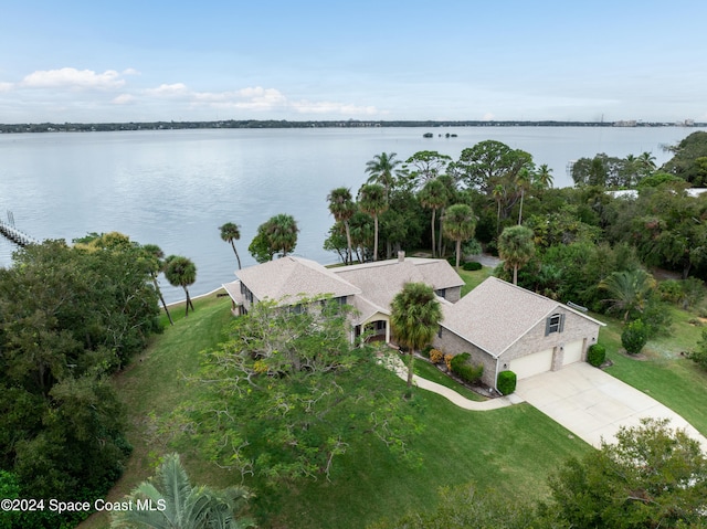 drone / aerial view with a water view