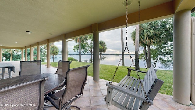 view of patio / terrace with a water view