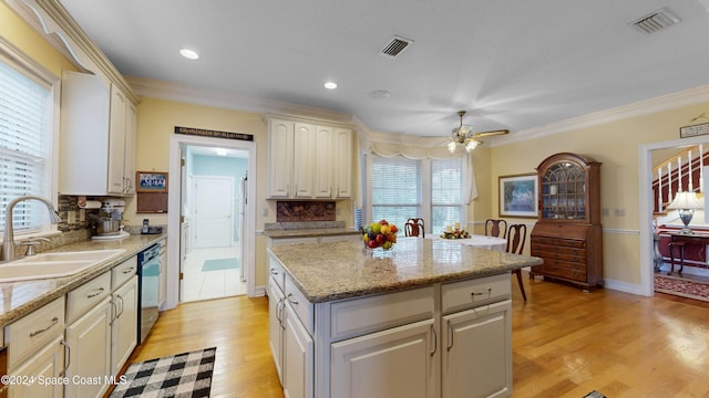 kitchen featuring light hardwood / wood-style floors, sink, and a wealth of natural light