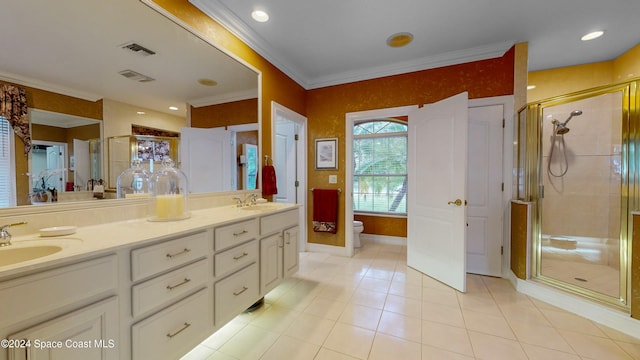 bathroom featuring tile patterned floors, an enclosed shower, ornamental molding, vanity, and toilet