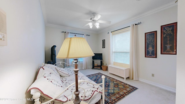 bedroom with ceiling fan, ornamental molding, and light carpet